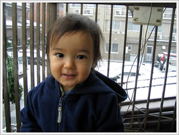 Kaika, seeing snow for first time, Dec. 29, 2004