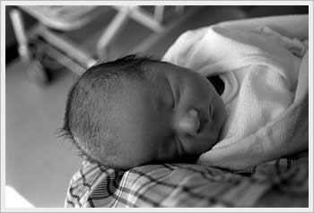 My son Kaika, 1 week old at the hospital, March 24, 2003: click for larger image (28K)