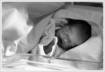 My son Kaika, 1 week old at the hospital, March 24, 2003: click for larger image (28K)