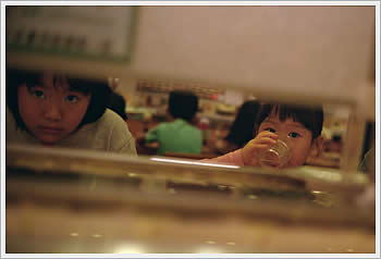 Girls, Sushi Restaurant, September 28, 2003: click for larger image (16K)
