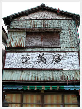 The front of a neighborhood store no longer in business, Warabi, Saitama, Japan (April 3, 2003)