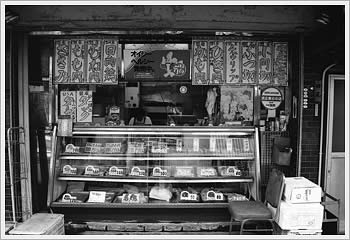 Butcher shop, Yanaka, Tokyo, July 12, 2003: click for larger image (53K)